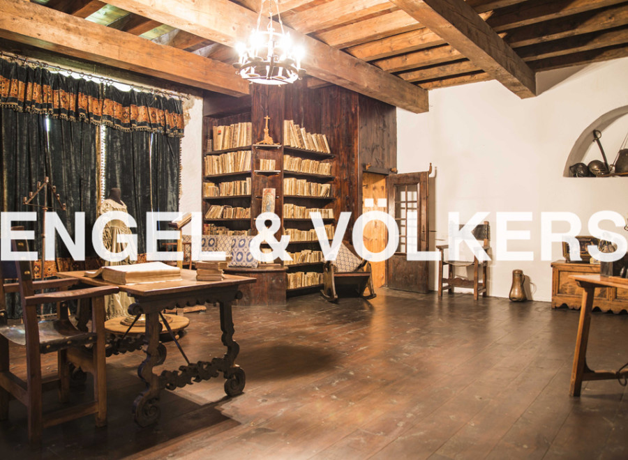 This stunning property boasts a rich history, evident in its antique wooden beams and floors.