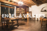 This stunning property boasts a rich history, evident in its antique wooden beams and floors.