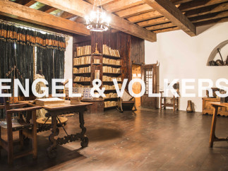 This stunning property boasts a rich history, evident in its antique wooden beams and floors.