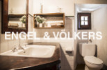 Charming bathroom with vintage sink and toilet.