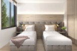 This serene bedroom boasts twin beds with plush gray upholstery, complemented by a light wood wall and floor.
