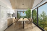 This stunning modern kitchen boasts a spacious design with sleek white cabinetry and wood flooring, creating a bright and airy atmosphere.