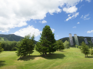 Enjoy breathtaking views of the mountains and lush greenery from this stunning property.