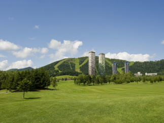 Discover a stunning property nestled amidst lush greenery and breathtaking mountain views.