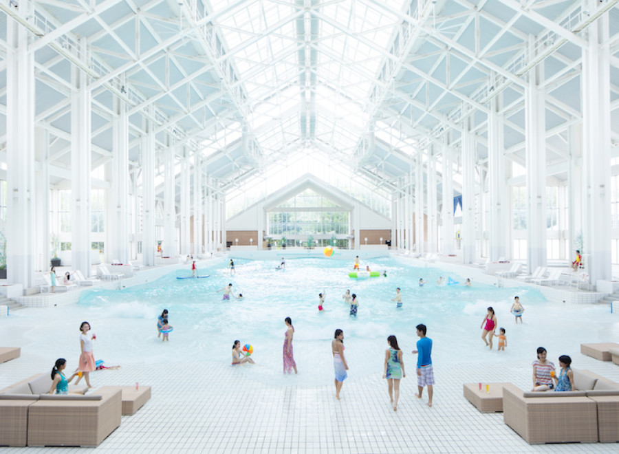 Experience the ultimate indoor aquatic paradise! This stunning property boasts a massive wave pool, perfect for family fun and relaxation.