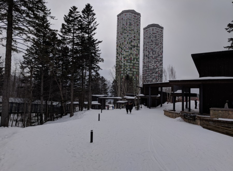 Explore the stunning architecture of the Tomamu resort, featuring unique tower structures.