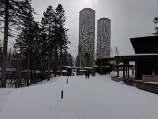 Explore the stunning architecture of the Tomamu resort, featuring unique tower structures.