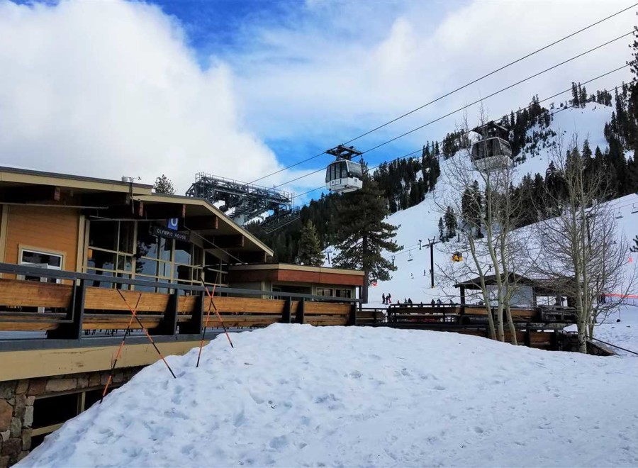 Enjoy a winter wonderland at this stunning ski resort! The "Olympic House" offers a cozy retreat with breathtaking views of the snowy slopes and cable cars.