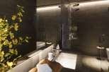 Luxurious bathroom with dark tile, a spacious shower with multiple shower heads, and a modern soaking tub.