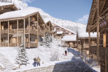 Experience the ultimate winter getaway in these stunning wooden chalets nestled in a snowy mountain landscape.