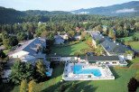 Discover a serene escape at this picturesque resort nestled amidst lush greenery and rolling hills.