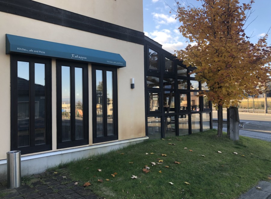 This charming restaurant boasts a modern design with large windows offering ample natural light and views of the surrounding landscape.