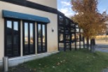 This charming restaurant boasts a modern design with large windows offering ample natural light and views of the surrounding landscape.