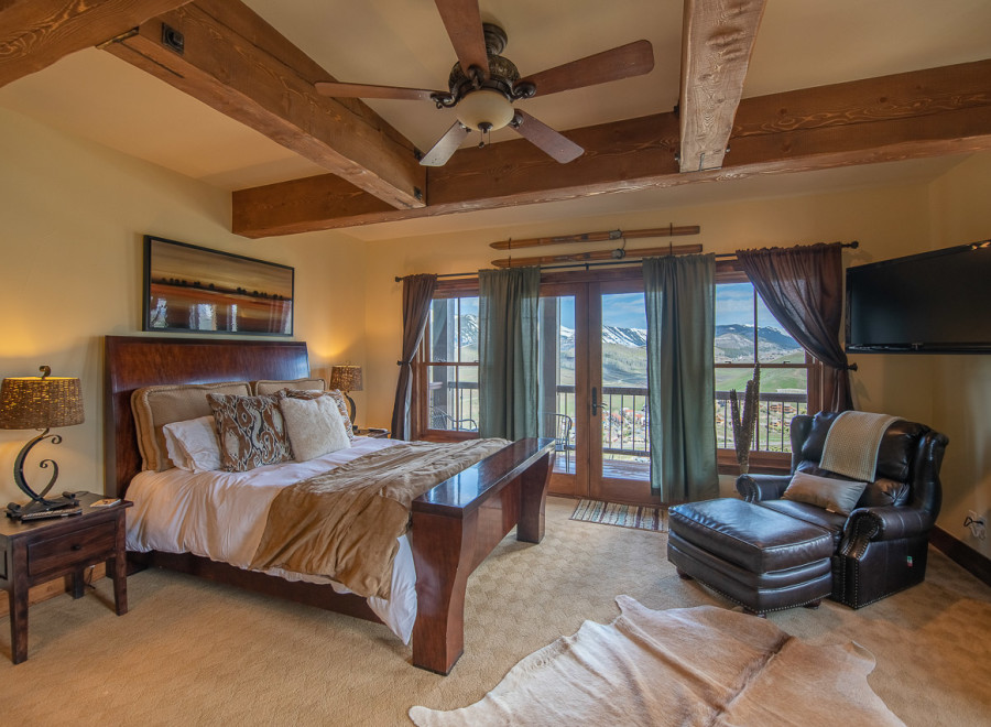 Luxurious mountaintop bedroom with stunning views.