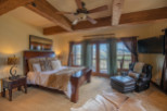 Luxurious mountaintop bedroom with stunning views.