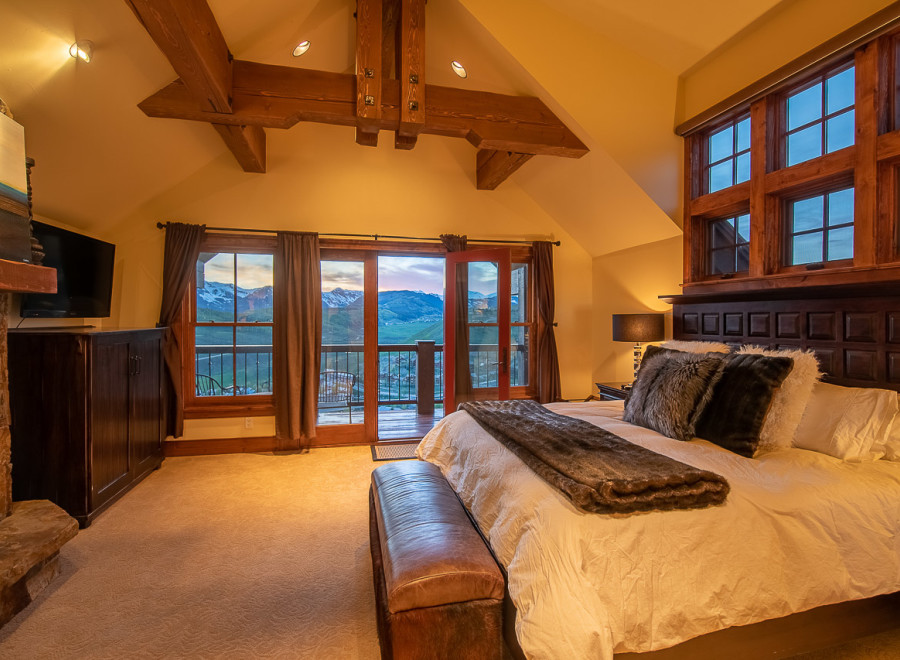 Luxurious mountaintop bedroom with breathtaking views.