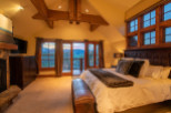 Luxurious mountaintop bedroom with breathtaking views.