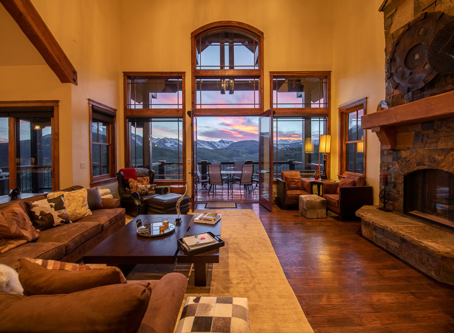 Luxury mountain lodge with breathtaking sunset views.