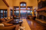 Luxury mountain lodge with breathtaking sunset views.