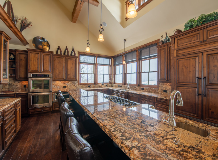 This stunning kitchen boasts a large island with seating, perfect for entertaining.