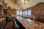 This stunning kitchen boasts a large island with seating, perfect for entertaining.