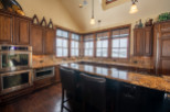 This stunning kitchen boasts a spacious island with seating, perfect for entertaining.