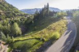 Nestled in a picturesque mountain setting, this property boasts stunning views and a serene atmosphere.