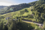 Nestled amidst the stunning mountain landscape, this property offers a serene escape.