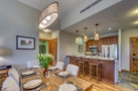 Experience luxury living in this stunning property, featuring a beautifully designed dining area perfect for entertaining.