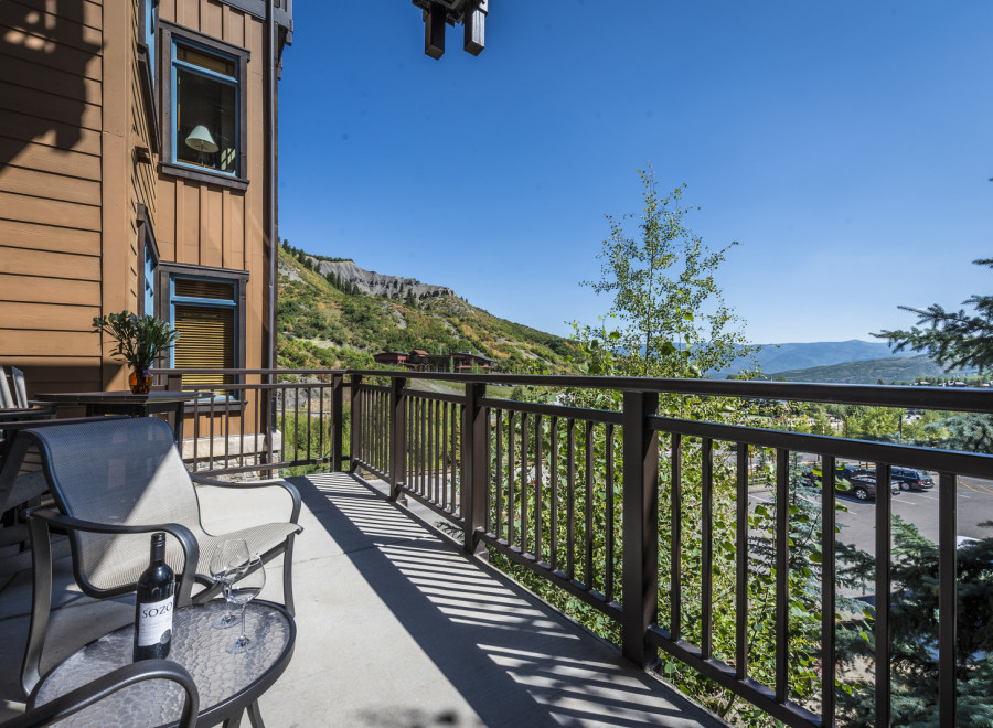 Enjoy breathtaking mountain views from this stunning balcony.