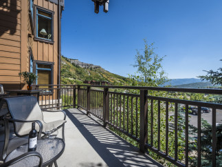 Enjoy breathtaking mountain views from this stunning balcony.