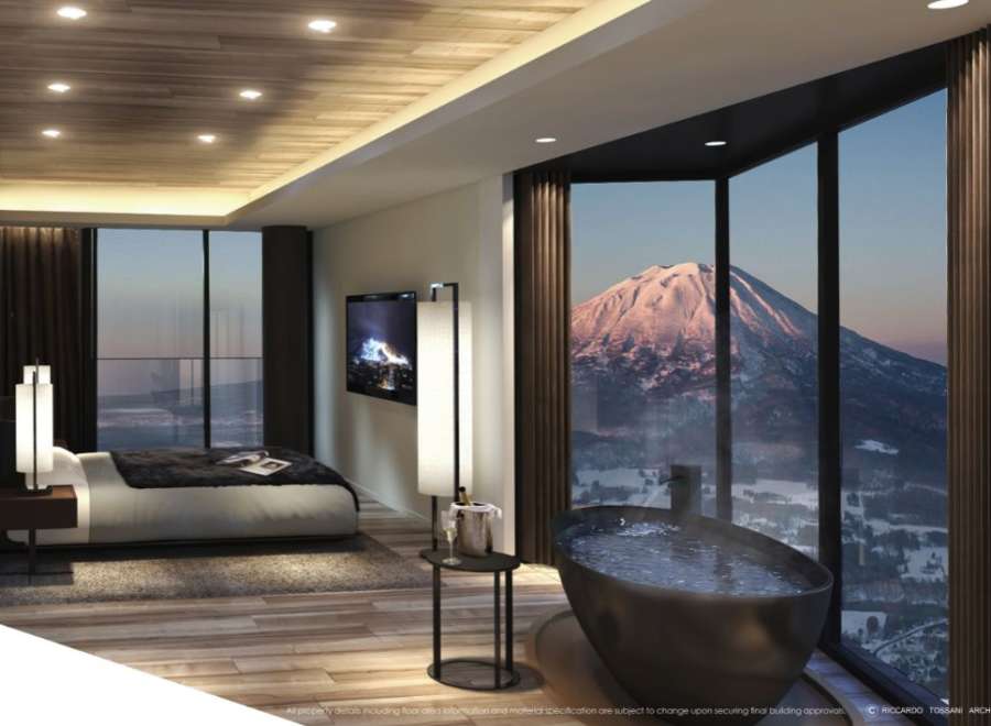 Experience luxury living in this stunning bedroom with breathtaking mountain views.