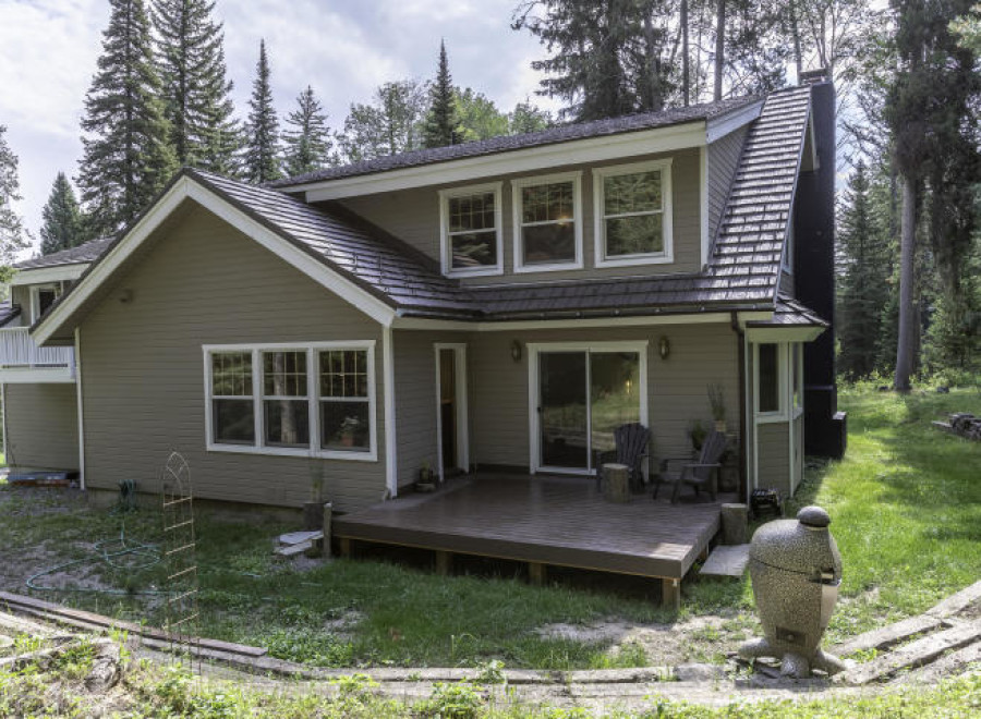 Discover your dream home nestled in a serene, wooded setting.