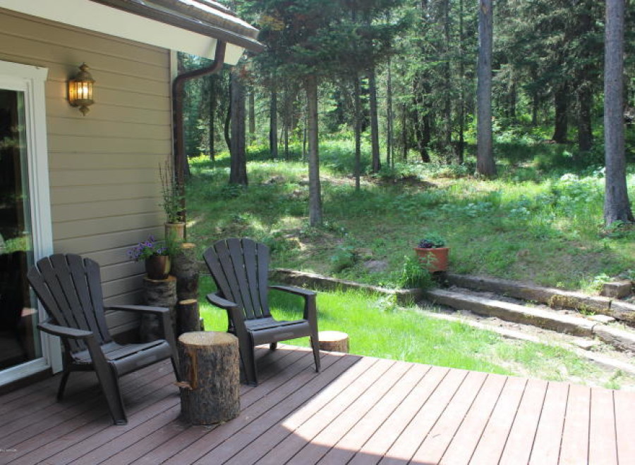 Enjoy the tranquility of nature from this charming outdoor space.