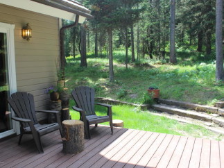 Enjoy the tranquility of nature from this charming outdoor space.