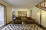 Step into this inviting living space, featuring two cozy armchairs and a stylish area rug.