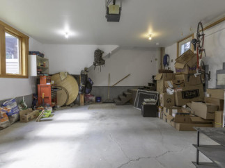 Discover the potential of this spacious garage, perfect for storage or projects.