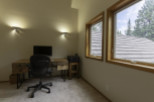 Discover the perfect home office setup in this bright and airy space.