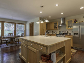 This stunning kitchen boasts a spacious island, perfect for meal prep and entertaining.