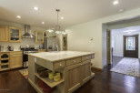 Step into this inviting kitchen, featuring a spacious island perfect for meal prep and entertaining.