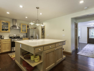Step into this inviting kitchen, featuring a spacious island perfect for meal prep and entertaining.