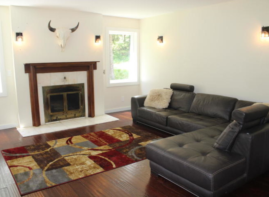 This stunning living room features a cozy sectional sofa, perfect for relaxing.
