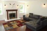 This stunning living room features a cozy sectional sofa, perfect for relaxing.