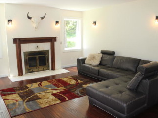 This stunning living room features a cozy sectional sofa, perfect for relaxing.