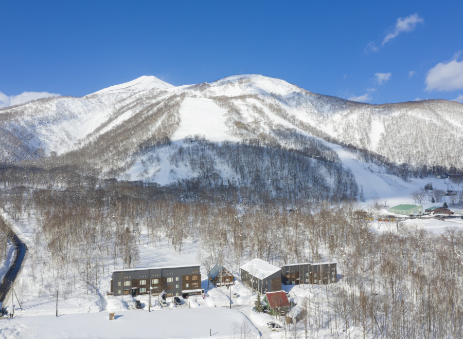 Nestled in a snowy mountainside, this stunning property offers breathtaking views and easy access to winter sports.