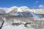 Nestled in a snowy mountainside, this stunning property offers breathtaking views and easy access to winter sports.