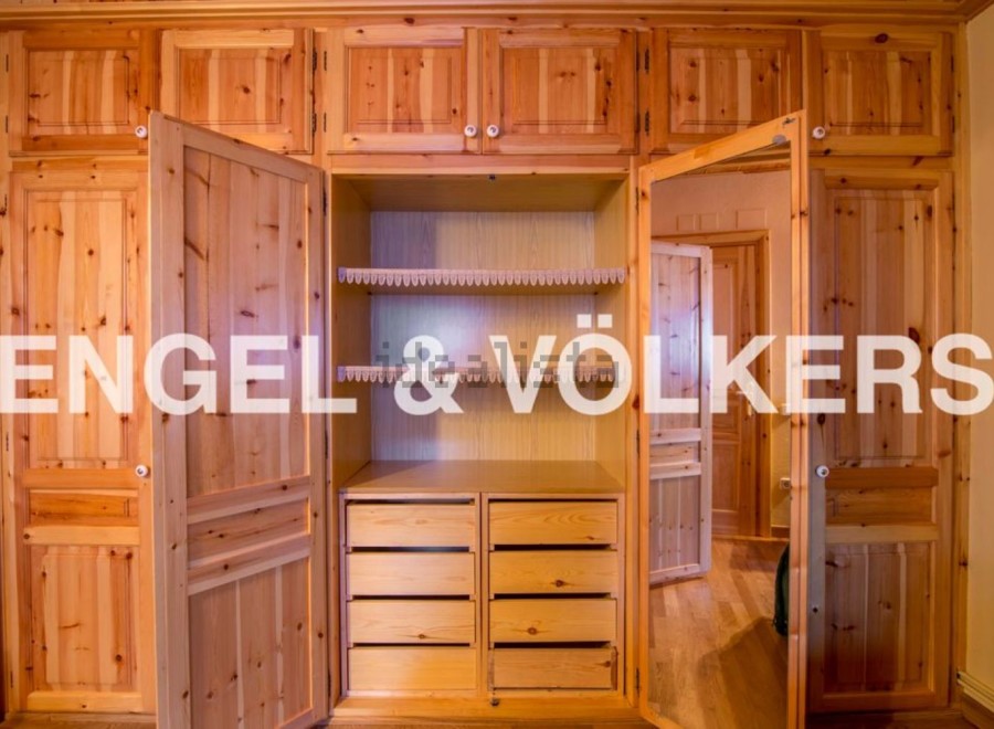 This stunning property boasts a spacious built-in wardrobe with ample storage, featuring both hanging and drawer space.