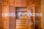 This stunning property boasts a spacious built-in wardrobe with ample storage, featuring both hanging and drawer space.
