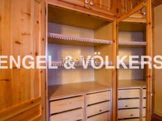 This stunning property boasts a spacious built-in wardrobe with ample shelving and drawers, perfect for storing all your belongings.