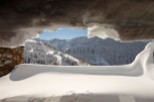 Escape to this stunning mountain chalet, where breathtaking views await from your snow-covered window seat.